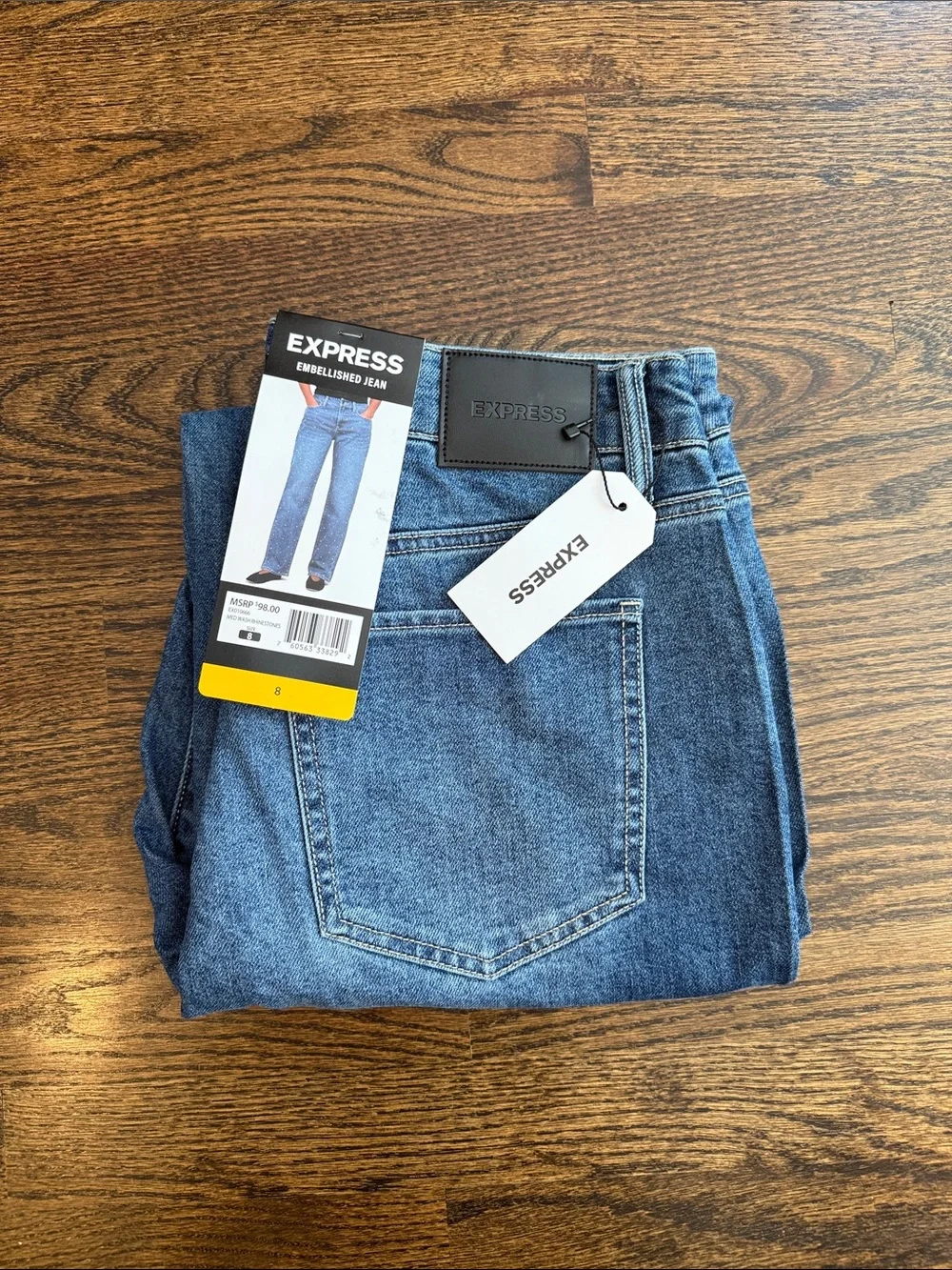 Woman’s  rhinestone express size 8 Medium wash Blue Bootcut Jeans